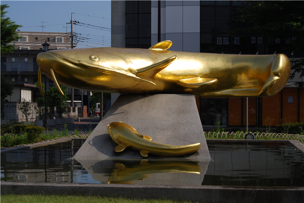 Golden catfish monument elephant